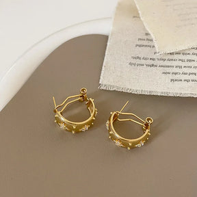 Brinco Chama Estrelada – Design Vintage com Zircônia